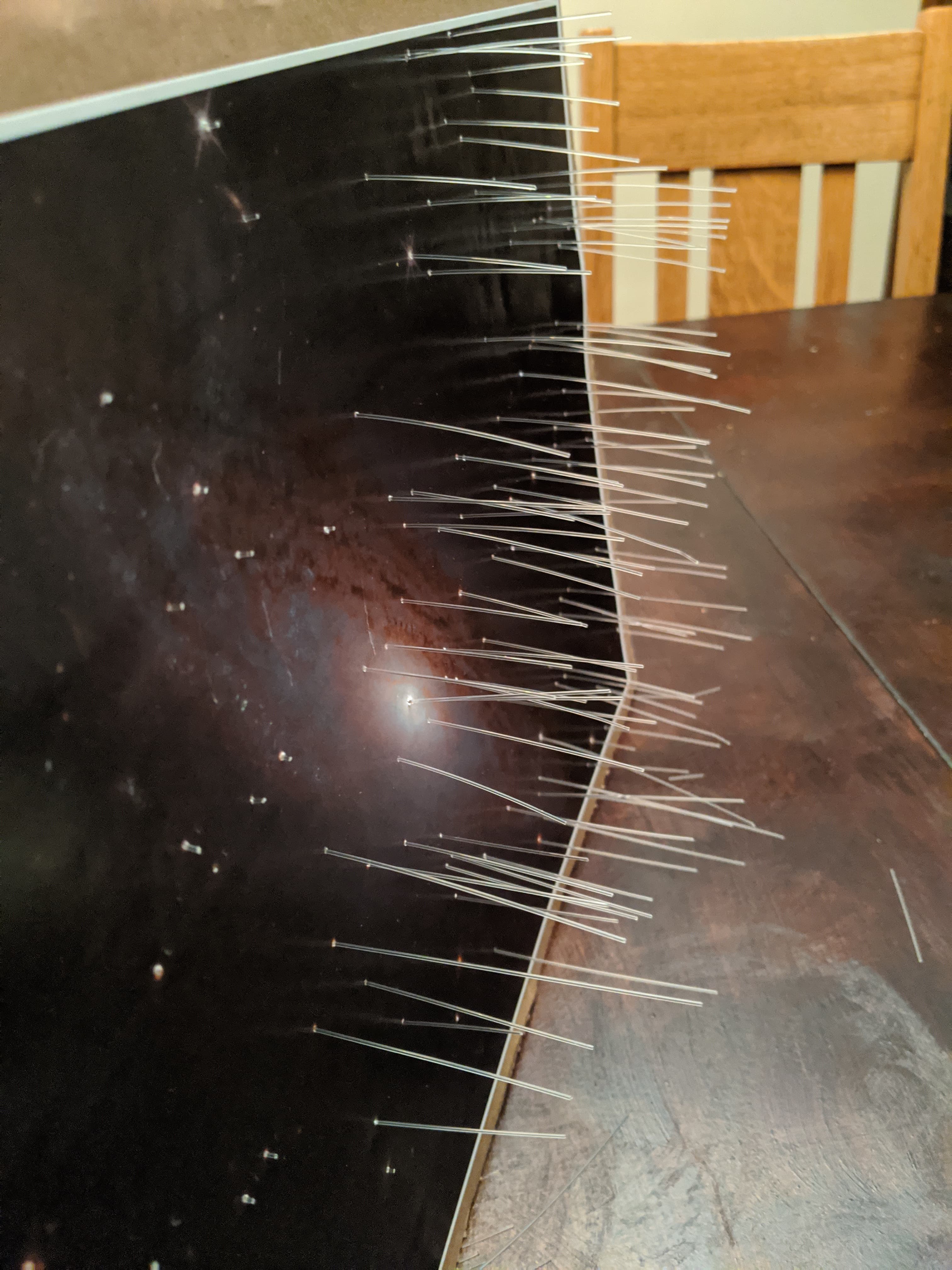 View of the fiber optic strands poking through the star holes