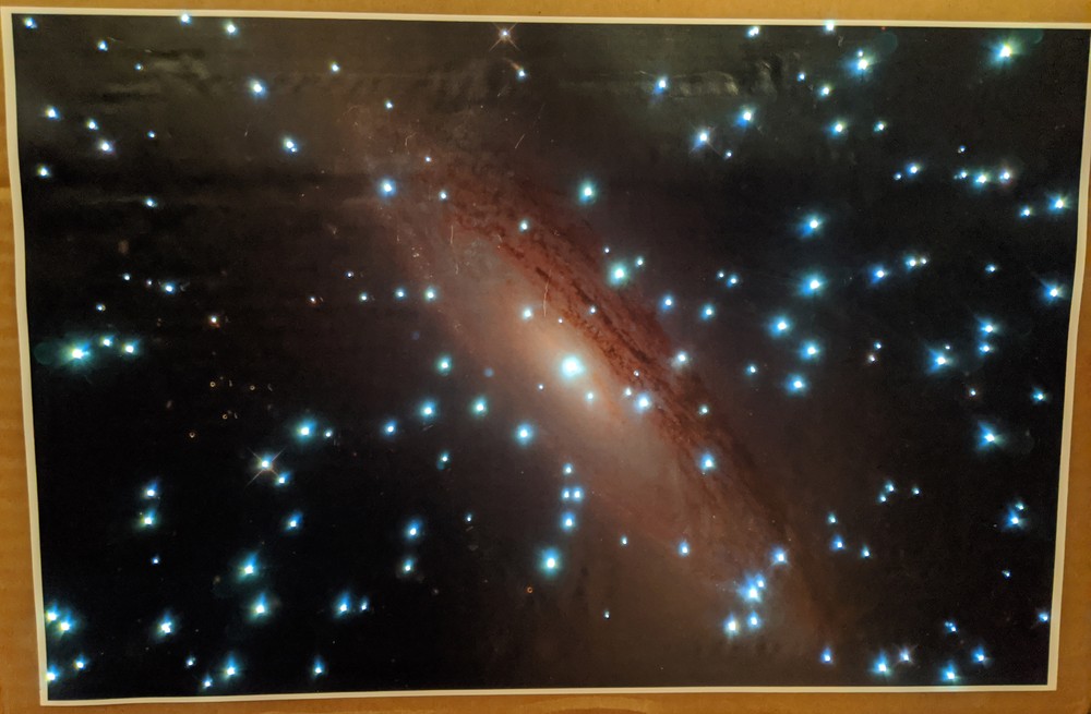 Astrophotography image with fiber optic strands connected to each star